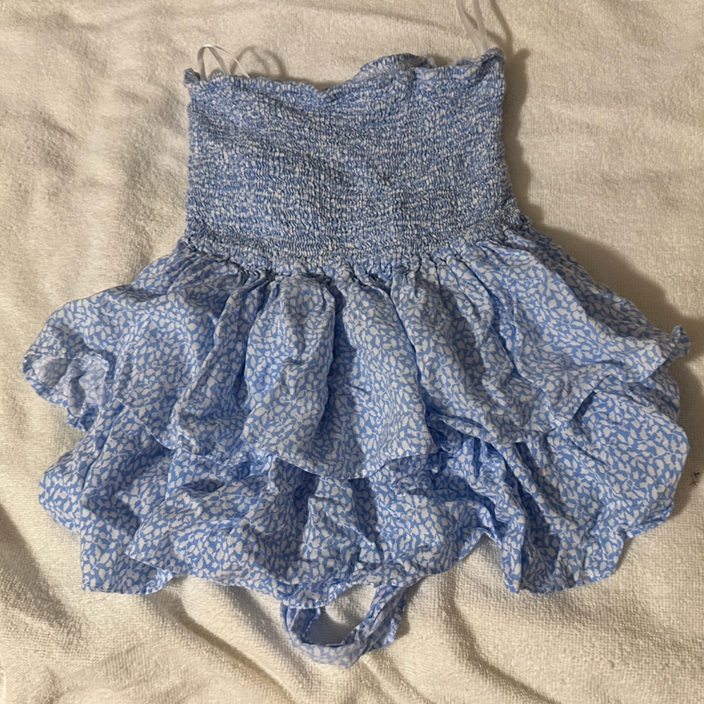 Blue Skirt with White Dots Design With a Bow in the Back in Size Medium!